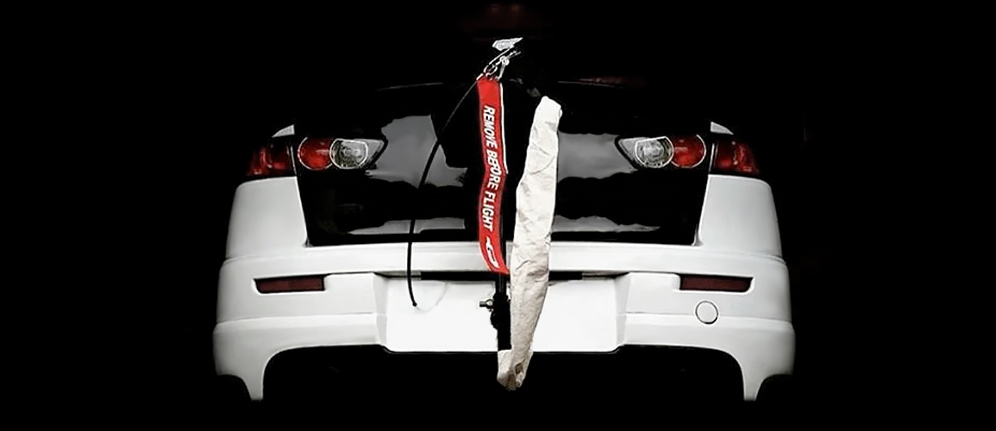 Evo X with the STM drag racing parachute