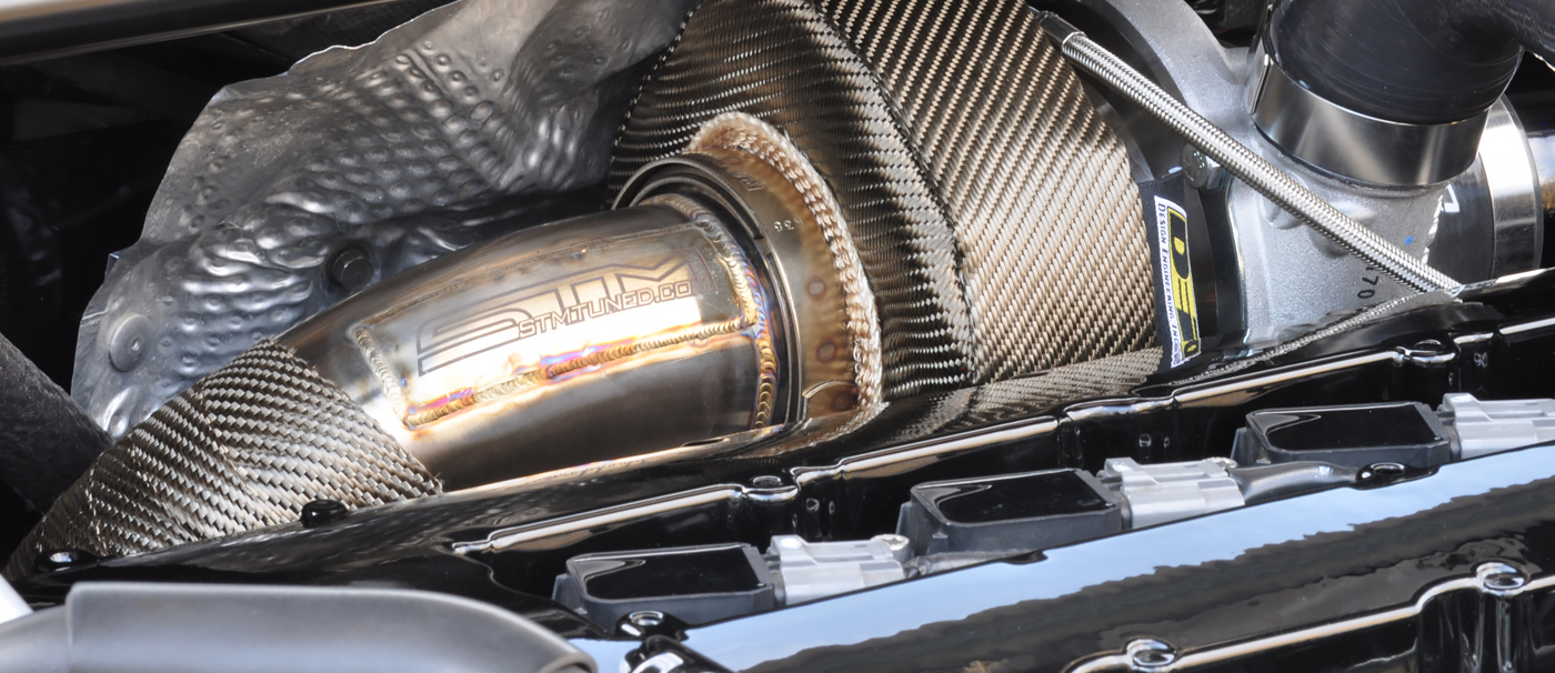 STM downpipe and turbo kit heat wrapped