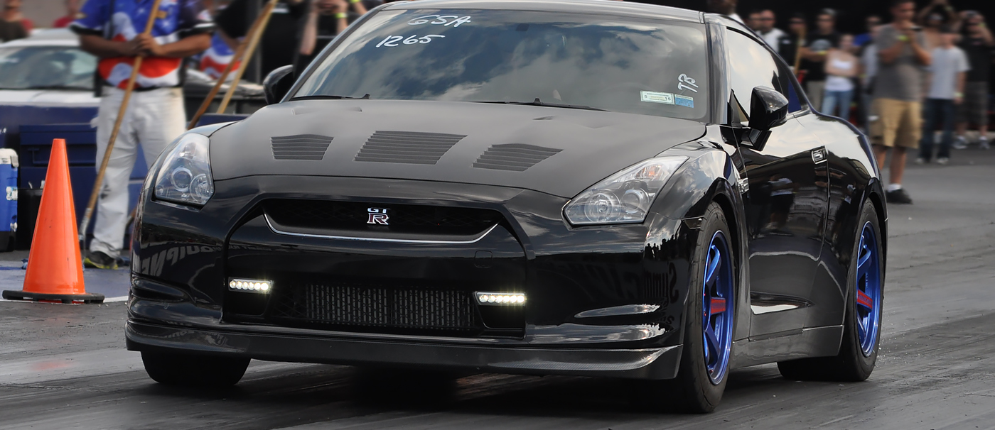 Black R35 GTR with blue Volk TE37 wheels